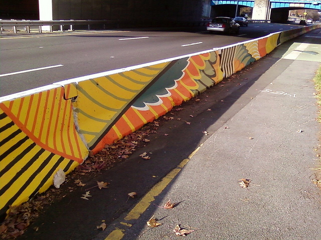 Artists: Pretty up the city by painting ugly old traffic barriers