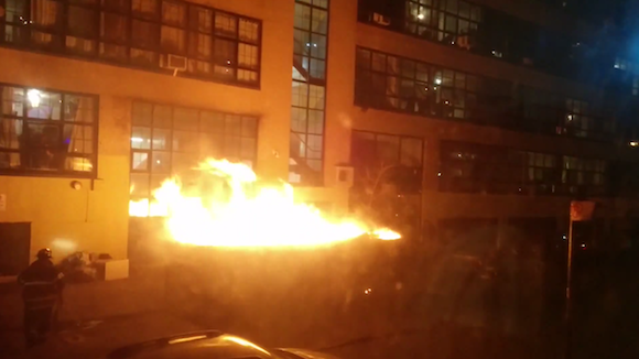 It’s Monday, so here’s a video of dumpster fire in front of the McKibbin Lofts