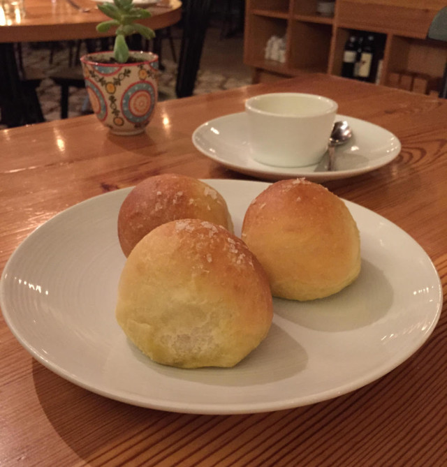 The house-made rolls are served with whipped honey & thyme butter. Photo via Meadowsweet. 