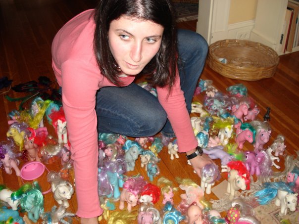 The author and her My Little Pony collection, presently stored in a laundry hamper. 