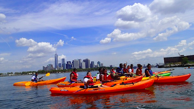 A group paddling in the New York Harbor off of Louis Valentino Jr. Pier Park. Photo via Red Hook Boaters 