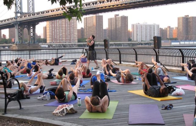 Make the world your yoga mat. Photo via Brooklyn Bridge Parents