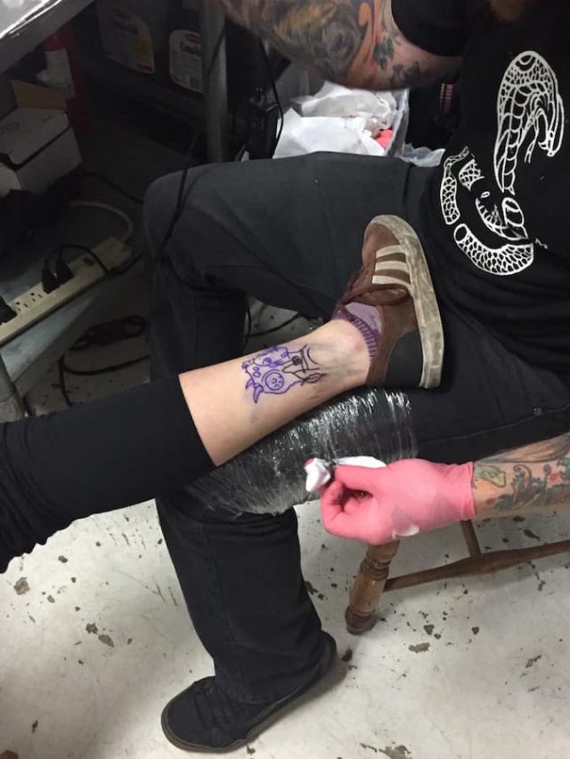 The Tank Girl tattoo in progress. Photo by Tim Donnelly/Brokelyn.